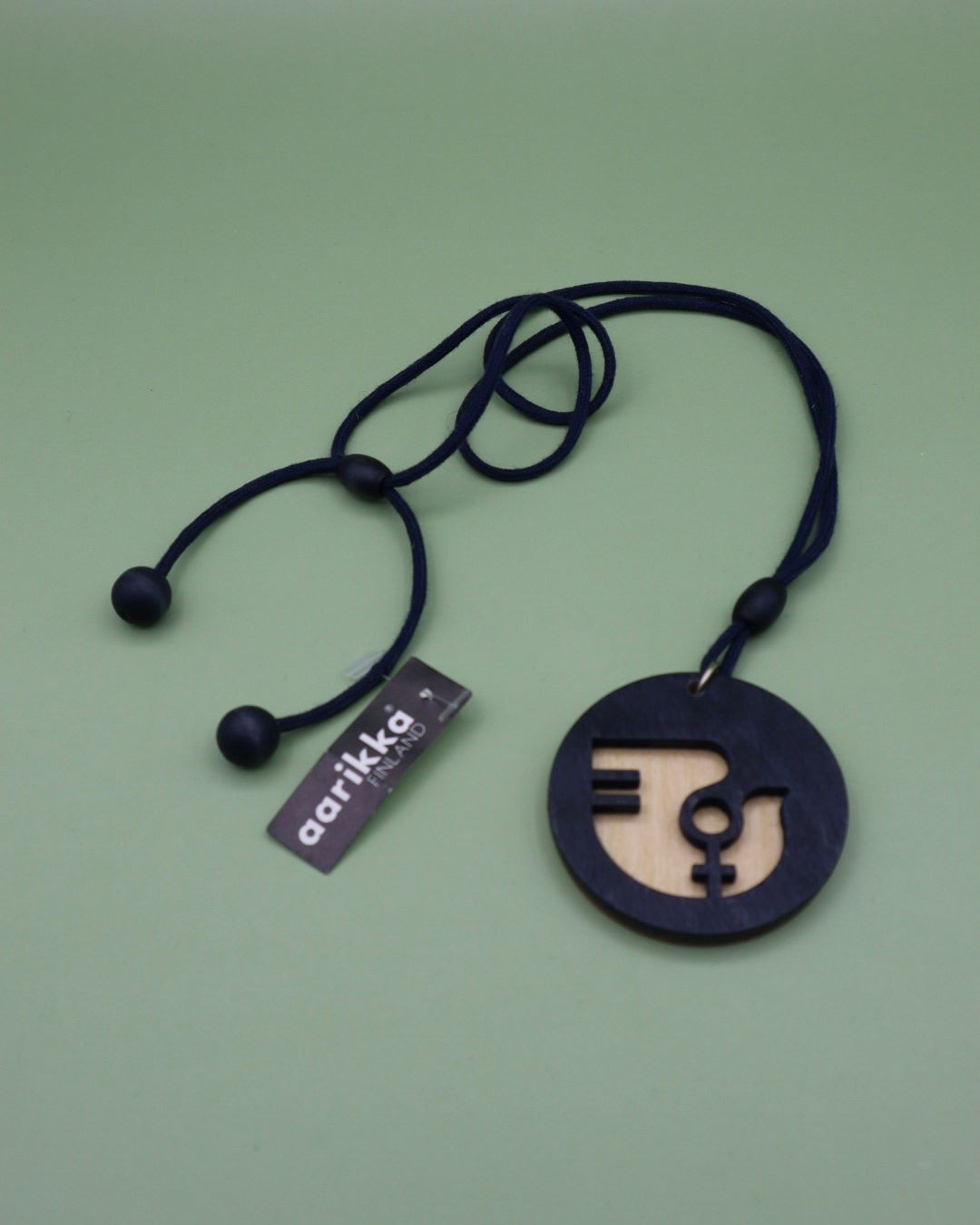 aarikka-unifem-koru-musta-puu